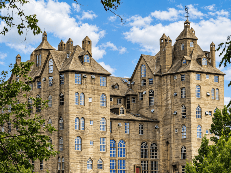 Historic gothic manor in a sunlit park